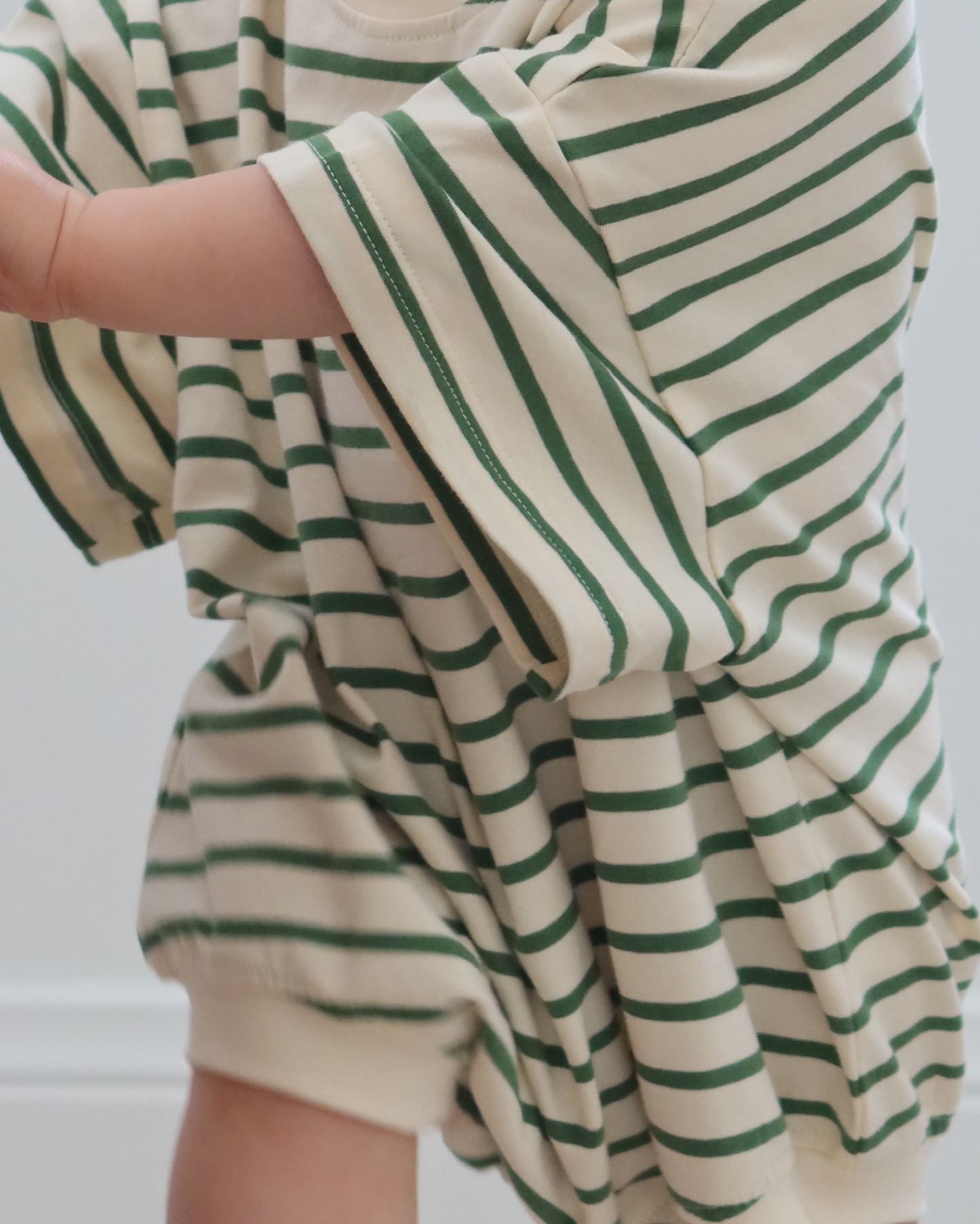 The Willem Romper in Green & Cream Stripe